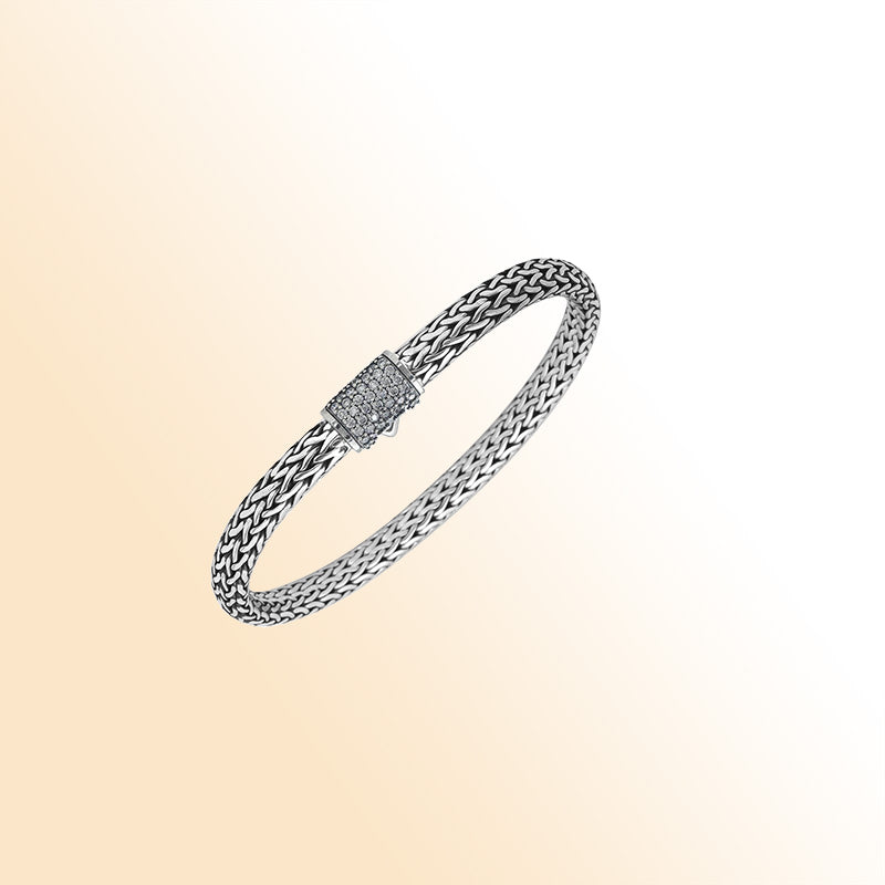 Sterling silver 4x6 mm handcrafted Bali bracelet with White Cubic Zirconia clasp and oxidized finish.