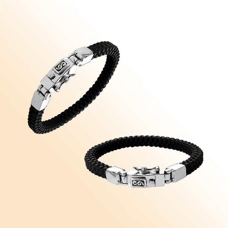 Sterling Silver And Black Woven Bracelet With Polished Clasp Detailing For A Bold And Refined Everyday Statement.