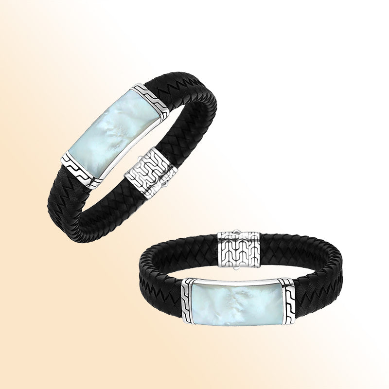 Sterling Silver And Black Braided Bracelet With White Mother Of Pearl Center For A Sleek And Distinctive Statement.