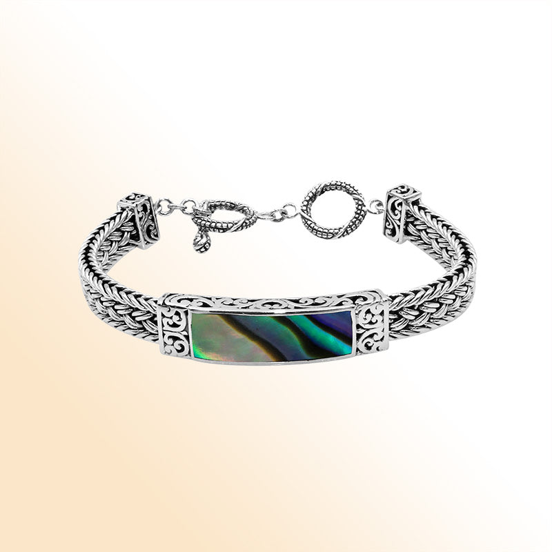 Handcrafted sterling silver bracelet with Abalone Shell and toggle lock made in Bali.