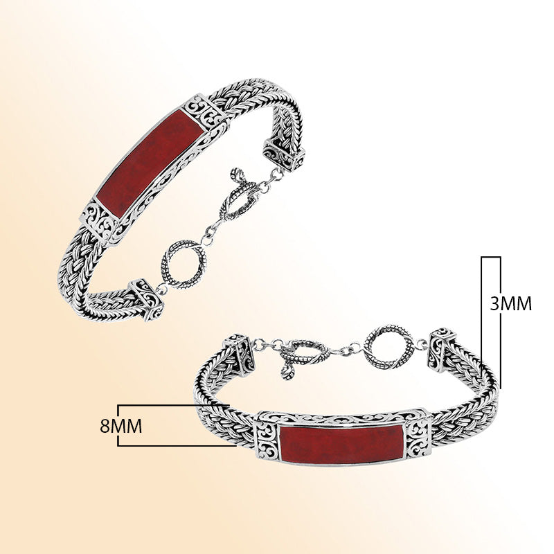 Handcrafted sterling silver bracelet with Coral inlay and toggle lock made in Bali.