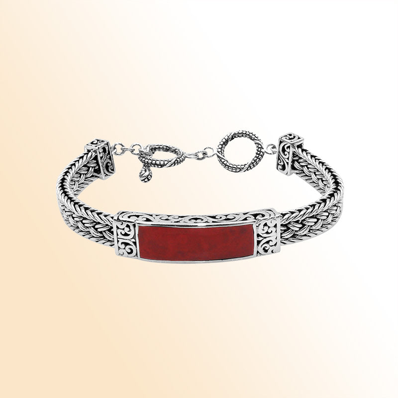 Handcrafted sterling silver bracelet with Coral inlay and toggle lock made in Bali.