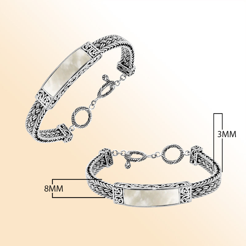 Handcrafted sterling silver bracelet with Mother Of Pearl inlay and toggle lock made in Bali.