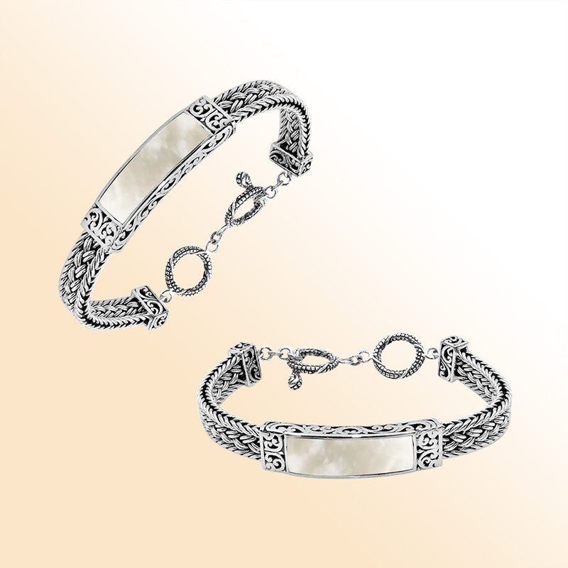 Handcrafted sterling silver bracelet with Mother Of Pearl inlay and toggle lock made in Bali.
