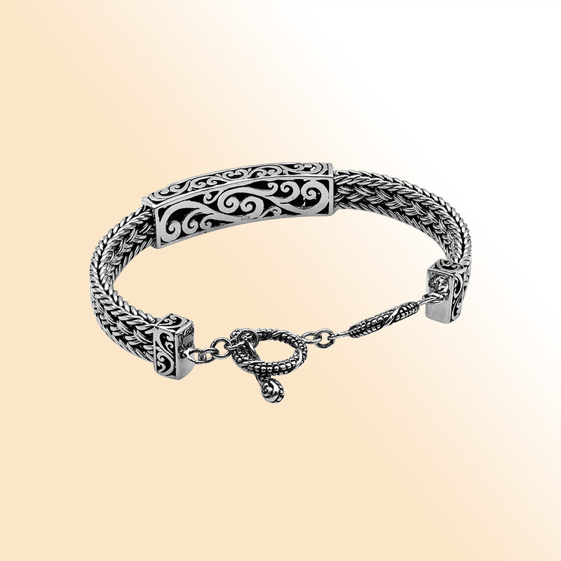Handcrafted sterling silver bracelet with Mother Of Pearl inlay and toggle lock made in Bali.