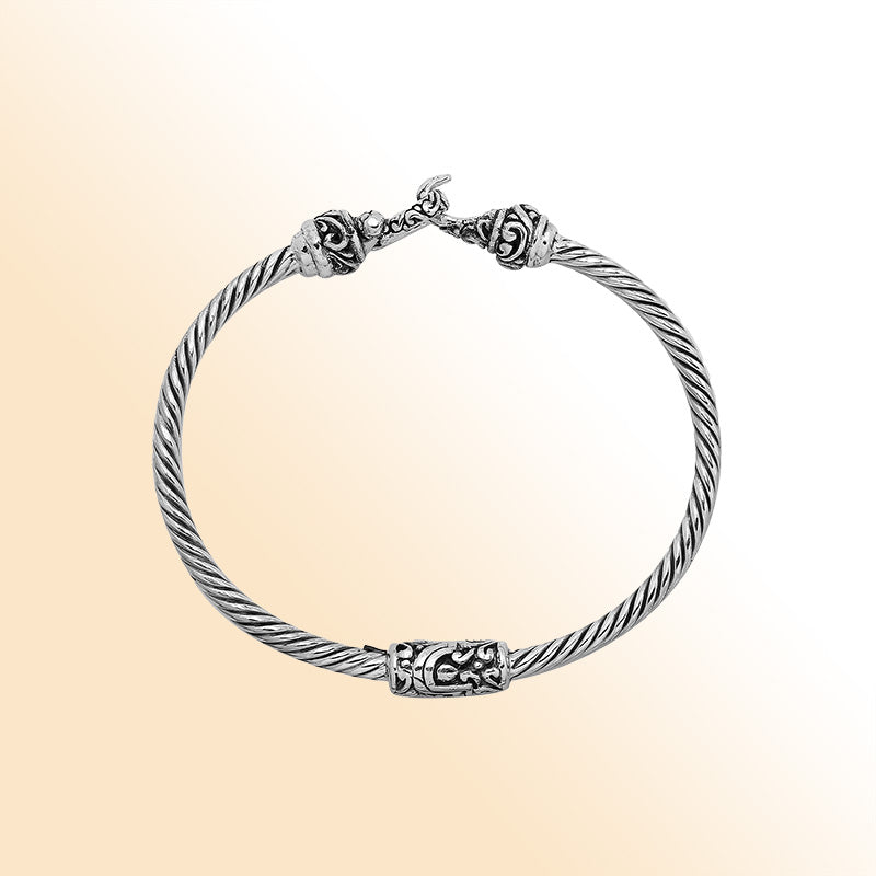 Handcrafted sterling silver Balinese hook bangle with twisted wire design made in Bali.