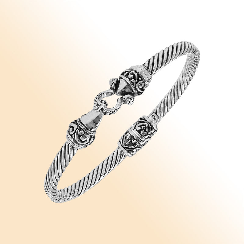 Handcrafted sterling silver Balinese hook bangle with twisted wire design made in Bali.