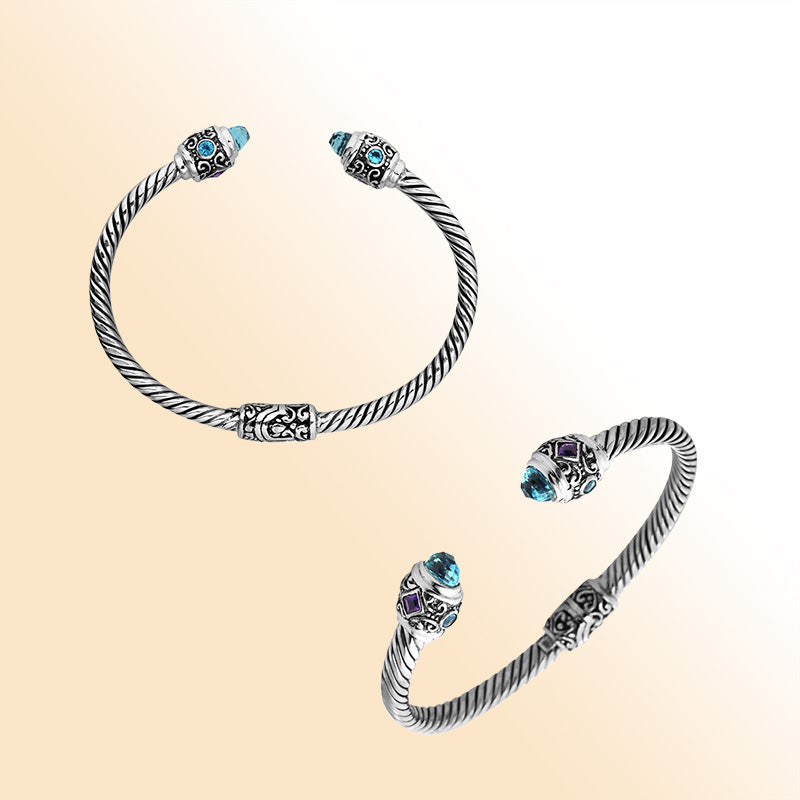 Handcrafted sterling silver bangle with Blue Topaz Quartz and Amethyst Quartz stones made in Bali.