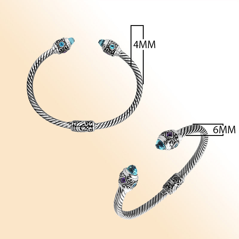 Handcrafted sterling silver bangle with Blue Topaz Quartz and Amethyst Quartz stones made in Bali.