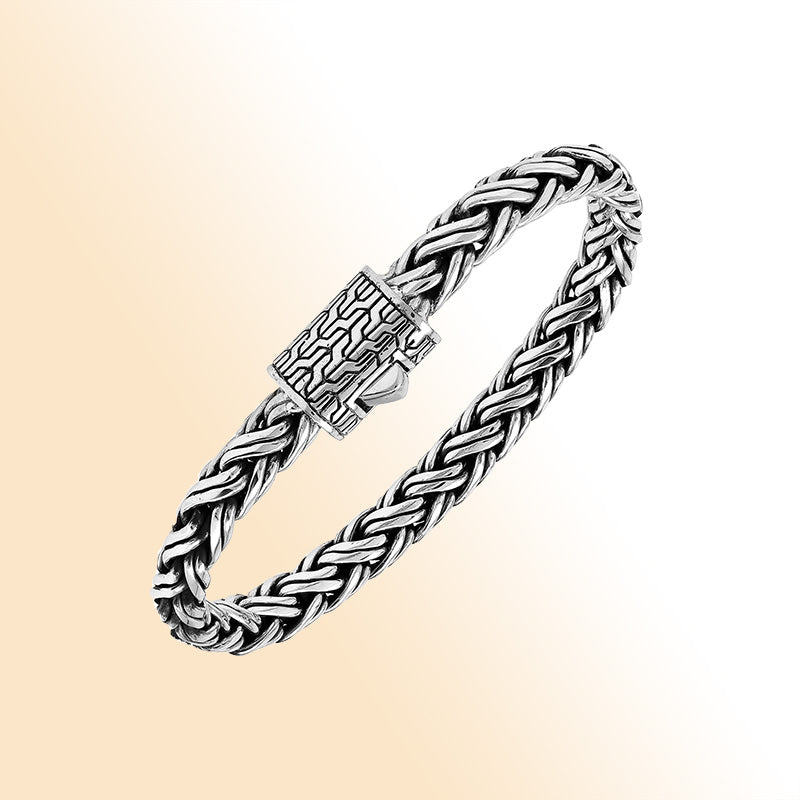 Sterling silver handwoven Bali bracelet with braided chain and secure designer clasp – unisex artisan jewelry for men and women.