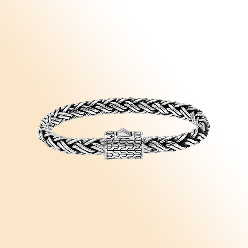 Sterling silver handwoven Bali bracelet with braided chain and secure designer clasp – unisex artisan jewelry for men and women.
