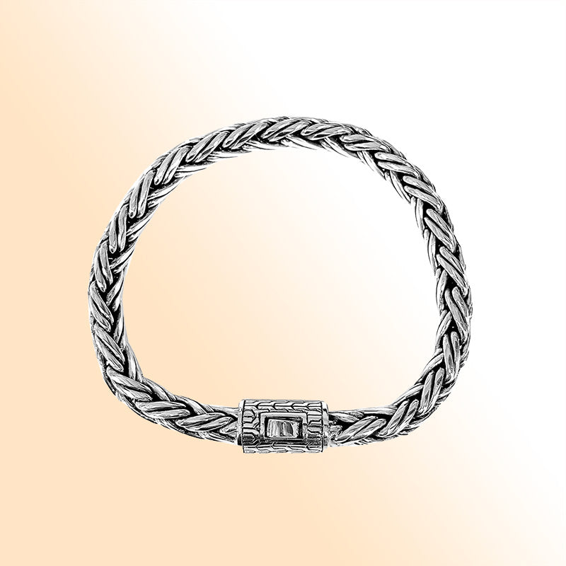 Sterling silver handwoven Bali bracelet with braided chain and secure designer clasp – unisex artisan jewelry for men and women.