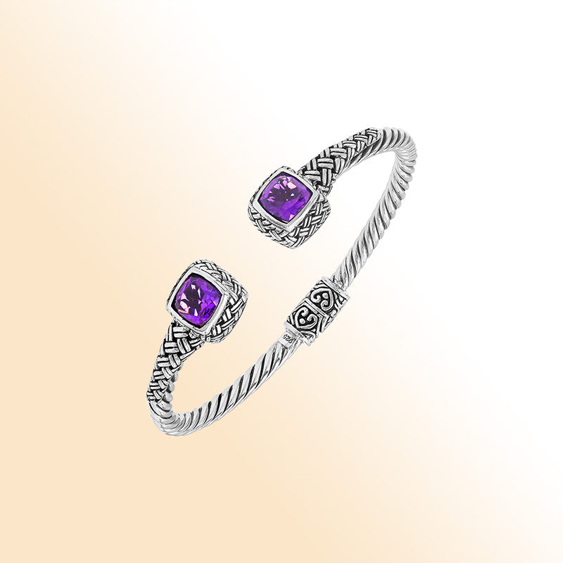 Elegant sterling silver braided bangle with amethyst quartz accents and Balinese detailing