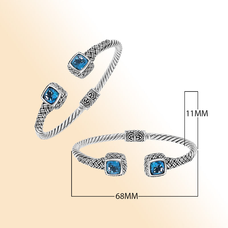Elegant sterling silver braided bangle with blue topaz quartz accents and intricate Balinese pattern