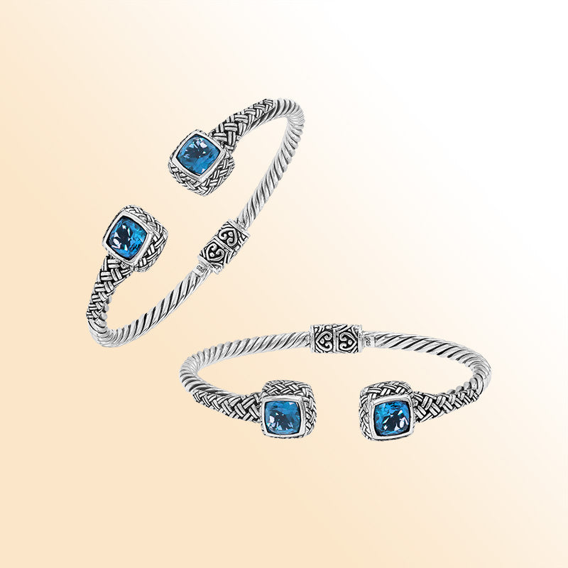 Elegant sterling silver braided bangle with blue topaz quartz accents and intricate Balinese pattern