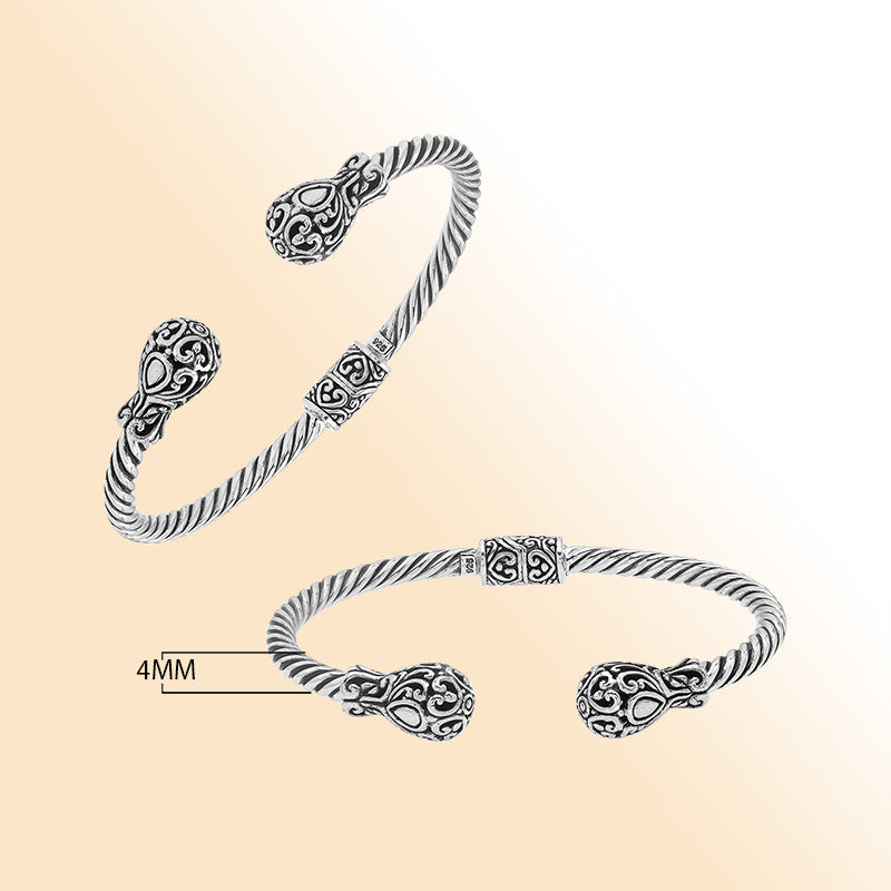 Elegant sterling silver open bangle with twisted rope design and Balinese engraving