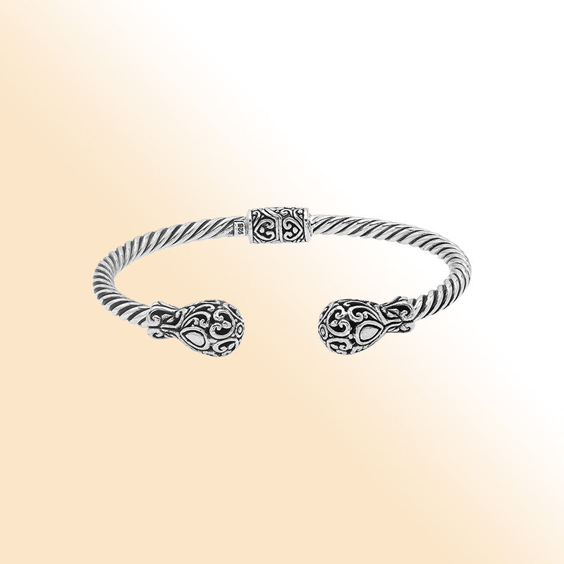 Elegant sterling silver open bangle with twisted rope design and Balinese engraving