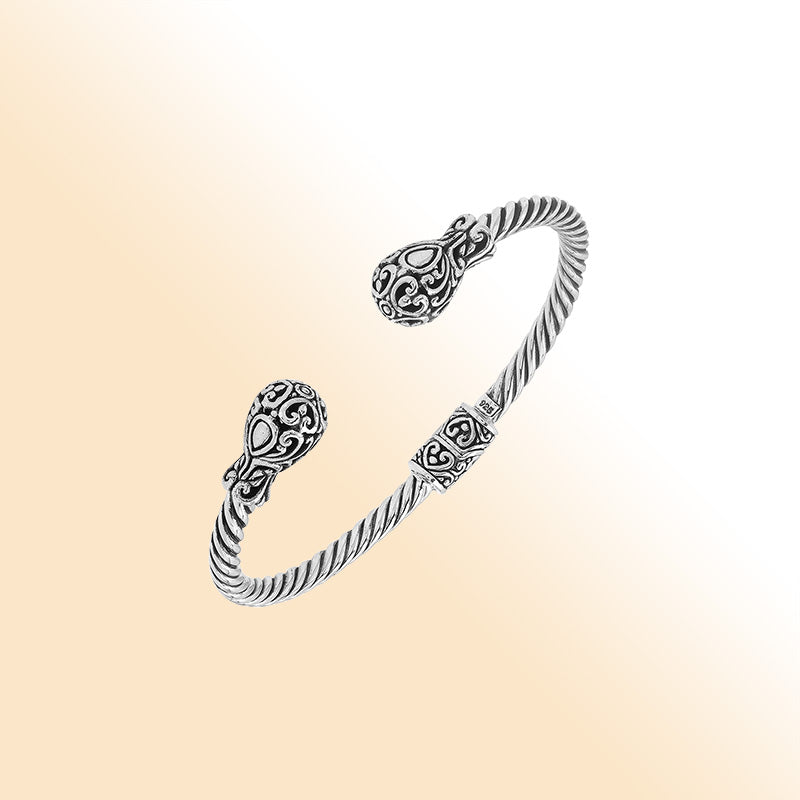 Elegant sterling silver open bangle with twisted rope design and Balinese engraving