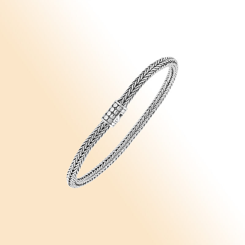 Elegant sterling silver wheat chain bracelet with dotted Balinese clasp and polished finish