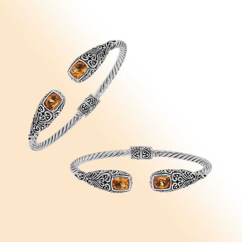 Sterling silver twisted bangle with citrine quartz ends and Balinese oxidized detailing