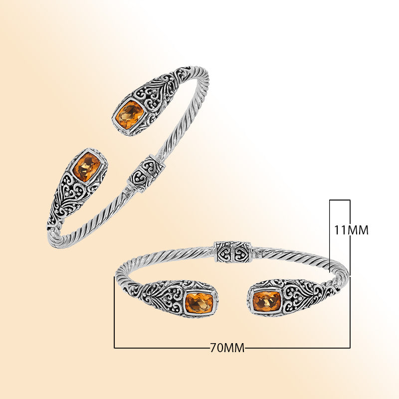 Sterling silver twisted bangle with citrine quartz ends and Balinese oxidized detailing