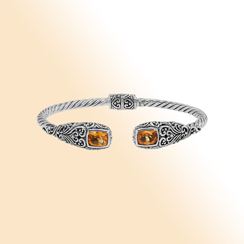 Sterling silver twisted bangle with citrine quartz ends and Balinese oxidized detailing