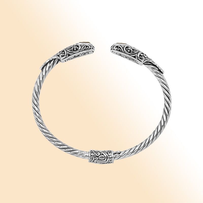 Sterling silver twisted bangle with citrine quartz ends and Balinese oxidized detailing
