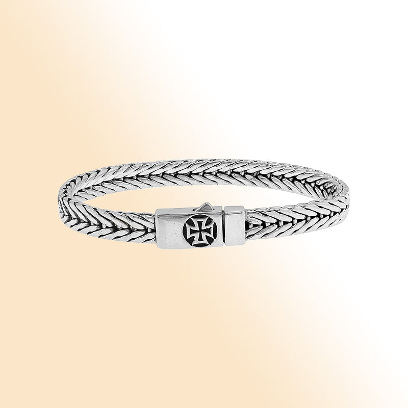 Elegant sterling silver wheat chain bracelet with cross clasp and polished Balinese design