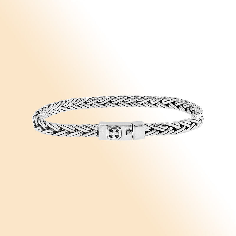 Elegant sterling silver wheat chain bracelet with cross push clasp and Balinese detailing