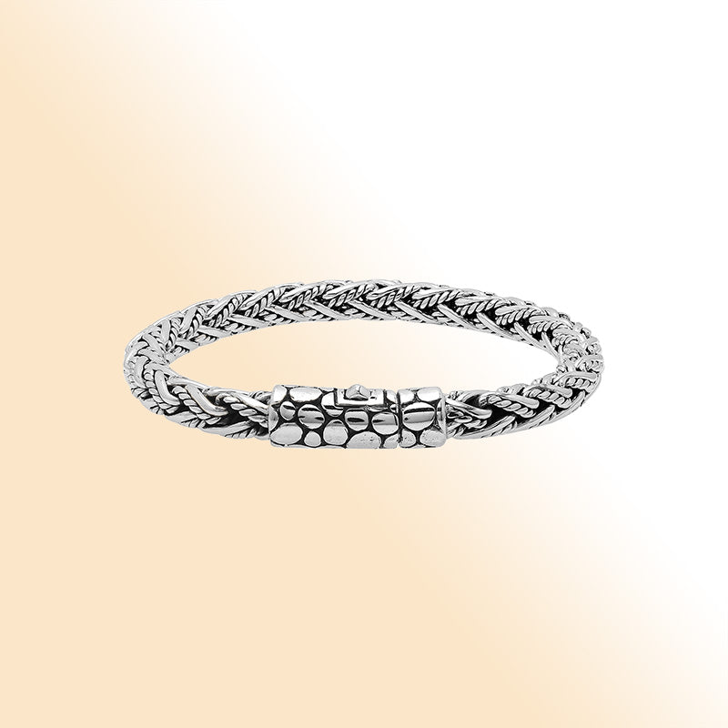 Sterling silver woven chain bracelet with textured clasp and oxidized finish handcrafted in Bali