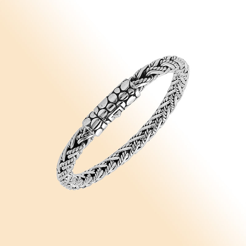 Sterling silver woven chain bracelet with textured clasp and oxidized finish handcrafted in Bali