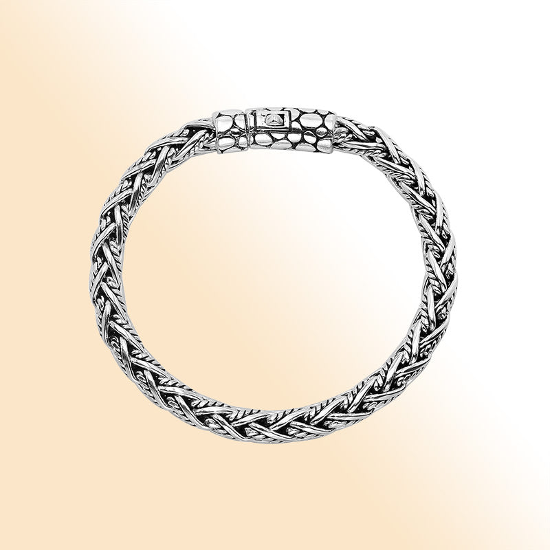 Sterling silver woven chain bracelet with textured clasp and oxidized finish handcrafted in Bali