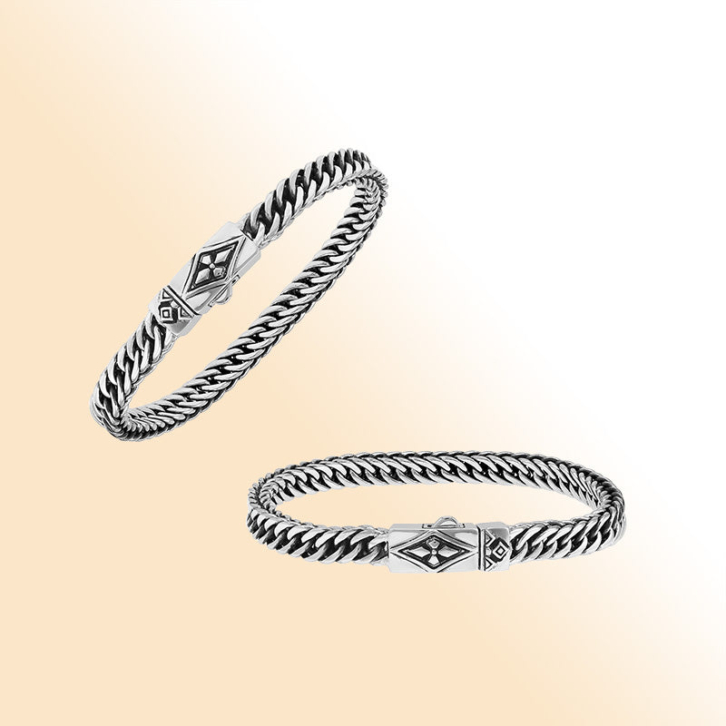 Sterling silver curb chain bracelet with geometric diamond clasp and oxidized finish