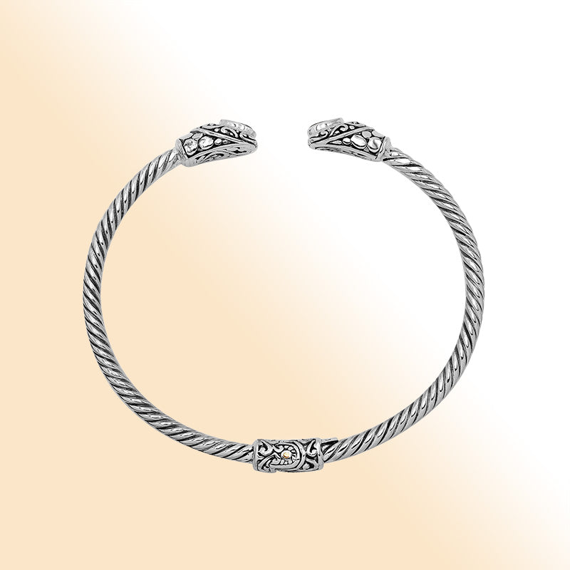 Elegant sterling silver open bangle with citrine quartz teardrop stones from India.