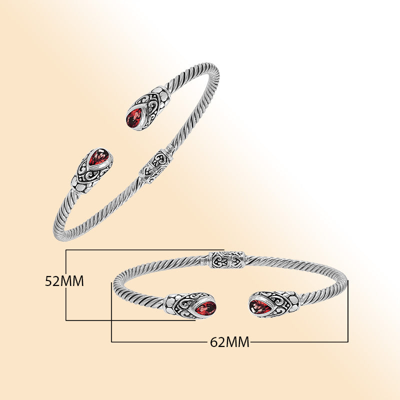 Sterling silver Balinese cuff bangle with Garnet Quartz charms and ornate scroll design.