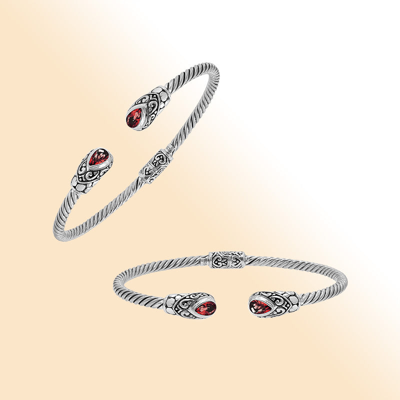Sterling silver Balinese cuff bangle with Garnet Quartz charms and ornate scroll design.