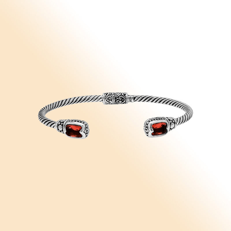 Sterling silver Balinese cuff bangle with Garnet Quartz accents and ornate scroll design.