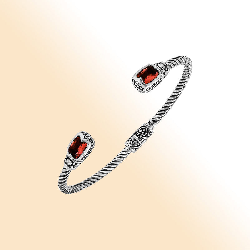 Sterling silver Balinese cuff bangle with Garnet Quartz accents and ornate scroll design.