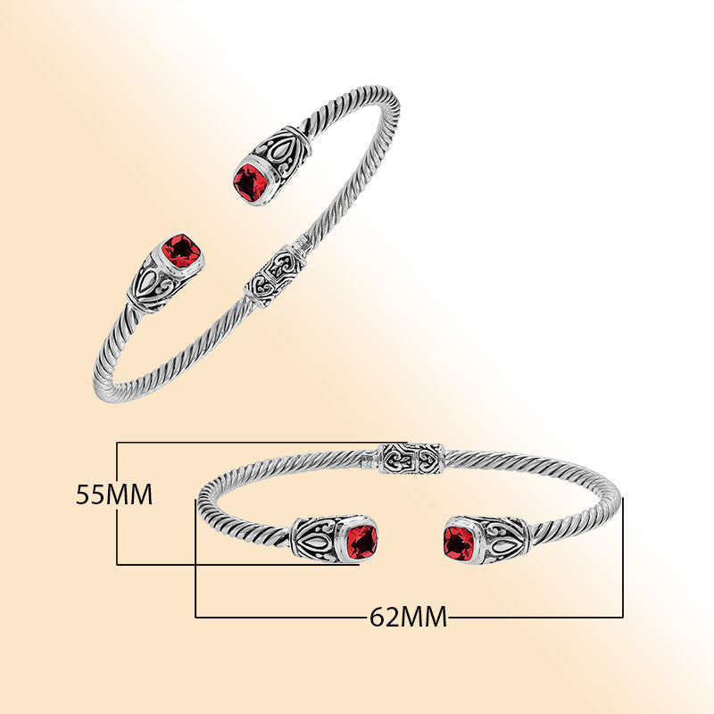 Sterling silver Balinese cuff bangle with Garnet Quartz accents and ornate scroll design.