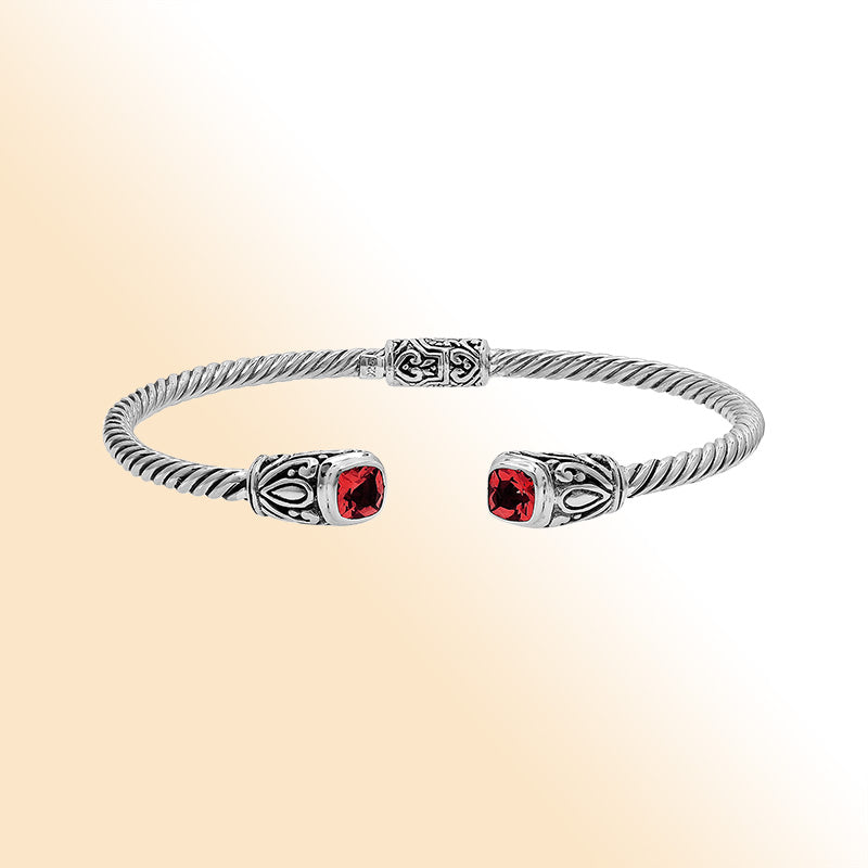 Sterling silver Balinese cuff bangle with Garnet Quartz accents and ornate scroll design.