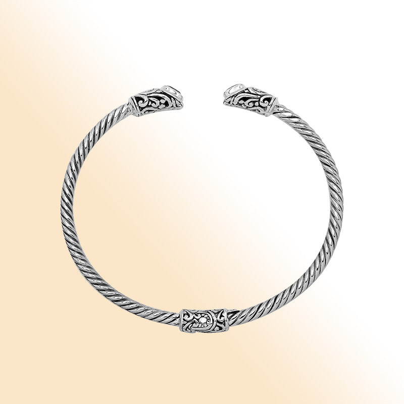 Sterling silver Balinese cuff bangle with Garnet Quartz accents and ornate scroll design.