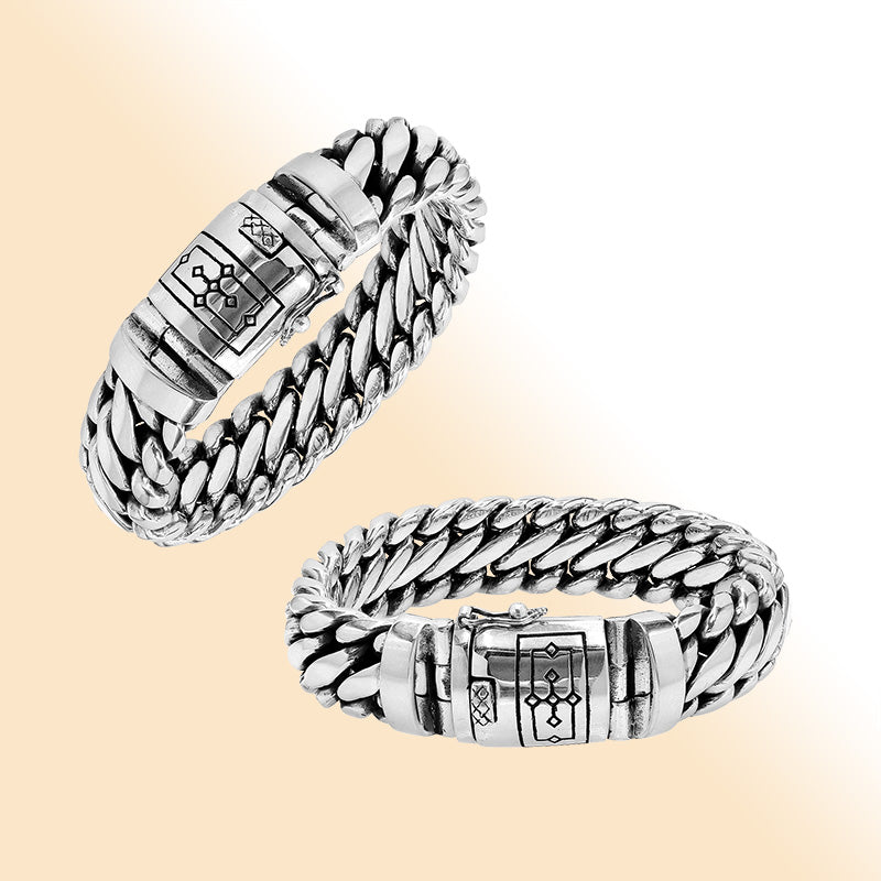 Sterling silver unisex curb chain bracelet with polished finish and engraved box clasp.