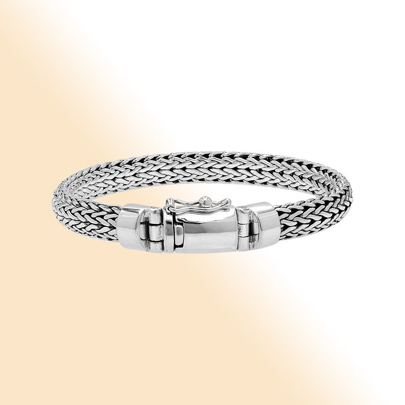 Sterling silver men’s wheat chain bracelet with mirror finish and box clasp closure.