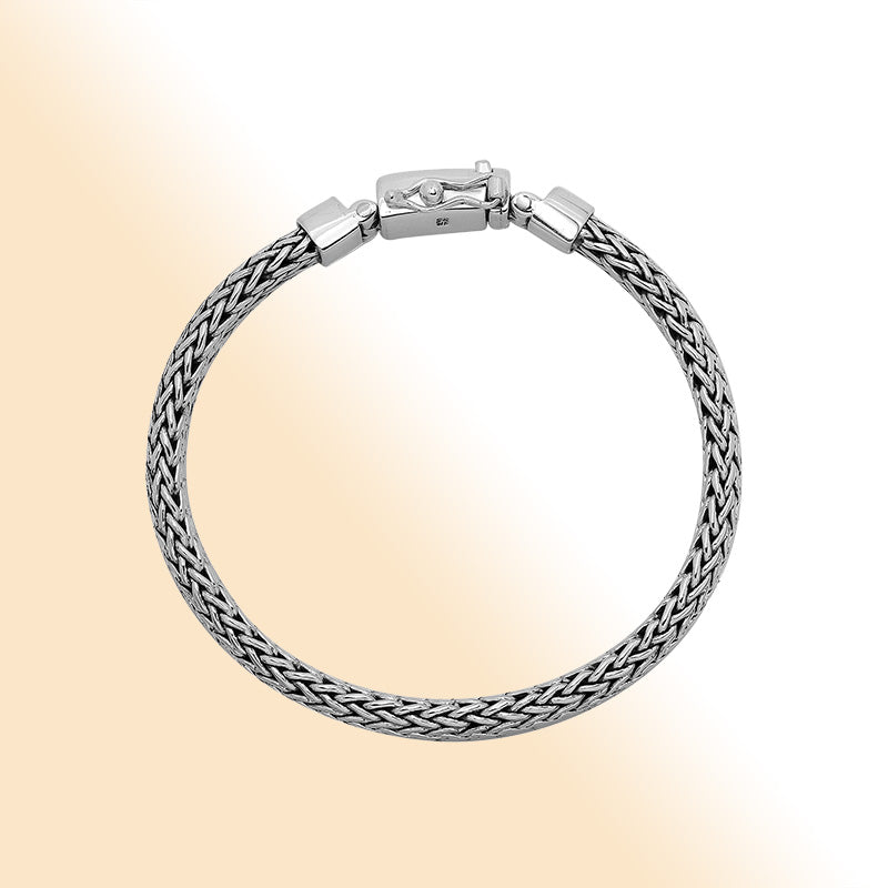 Sterling silver men’s wheat chain bracelet with mirror finish and box clasp closure.