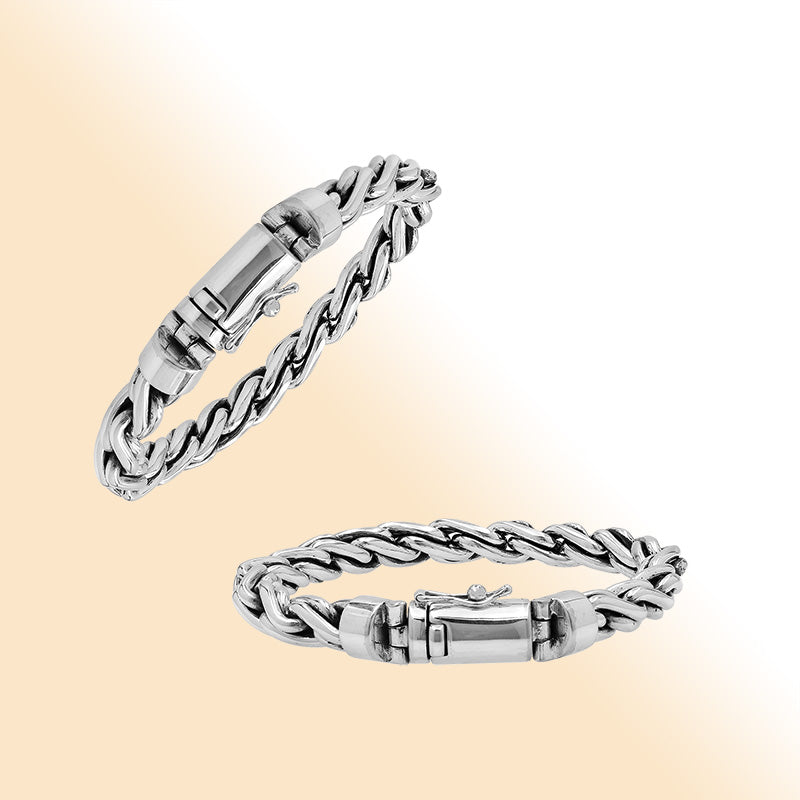 Sterling silver twisted chain bracelet with polished finish and secure box clasp.