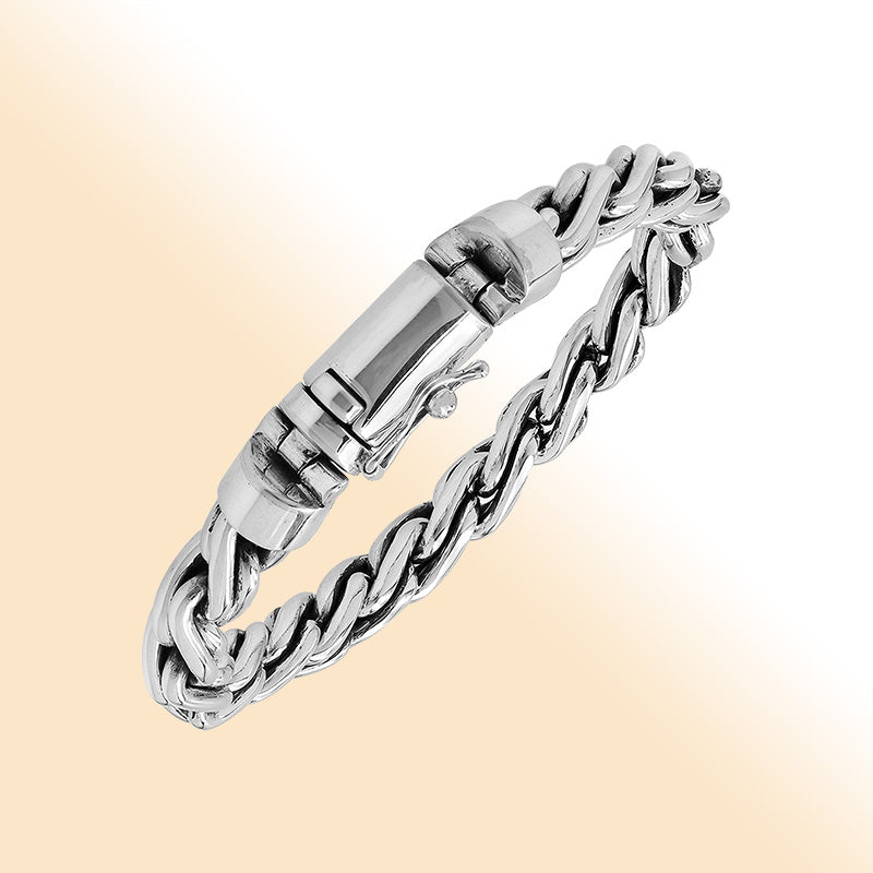 Sterling silver twisted chain bracelet with polished finish and secure box clasp.