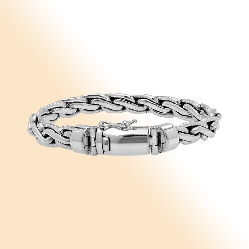 Sterling silver interlocked chain bracelet with polished finish and box clasp.