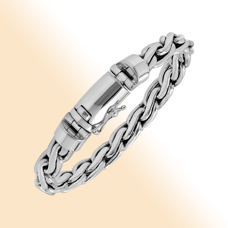 Sterling silver interlocked chain bracelet with polished finish and box clasp.