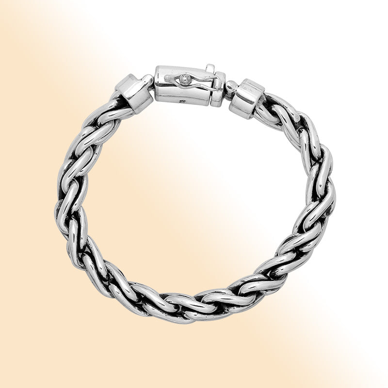 Sterling silver interlocked chain bracelet with polished finish and box clasp.