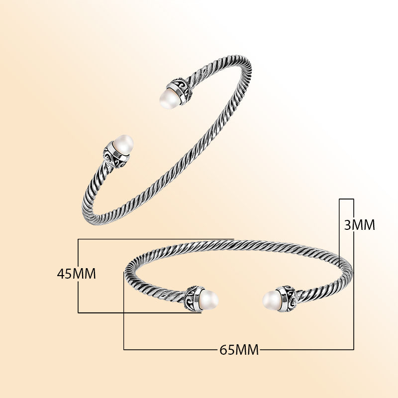 Sterling Silver Twisted Bangle With Pearl End Caps